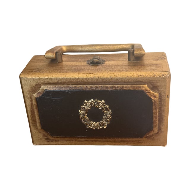 Acquired in England and later brought to the United States, this charming Royal London Ltd. box purse dates to 1968 and...