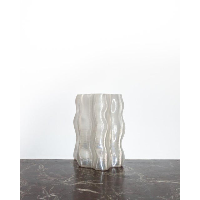 Large transparet magma vase by mana dimensions: d 16 x w 14 x h 24.5 cm. Materials: recycled pet from post-consumer...