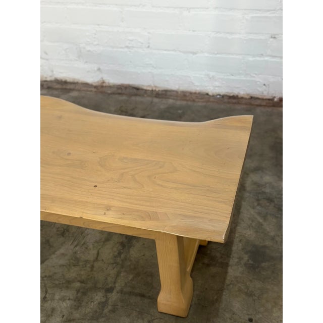W54 D19 H17.5 Sculptural handcrafted bench made in house. Item is made in solid maple and stained in a light white wash....