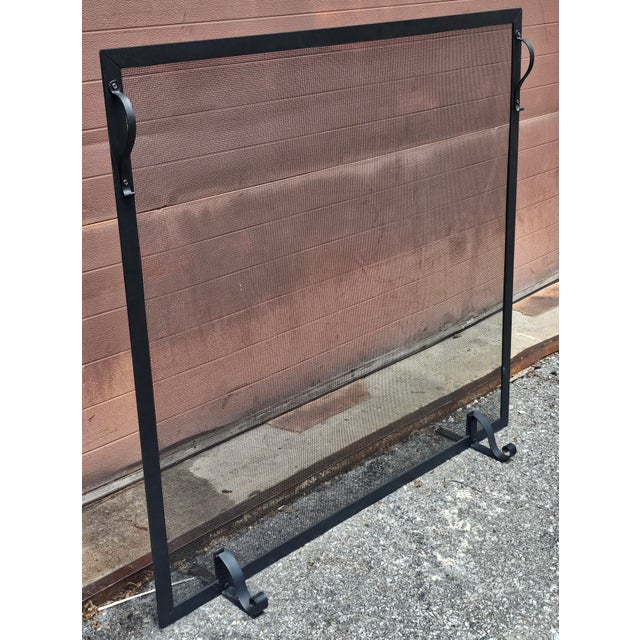 American Classical Style Painted Iron and Wire Mesh Fireplace Screen Measures 43" in width, 8" in depth and 42" in height.