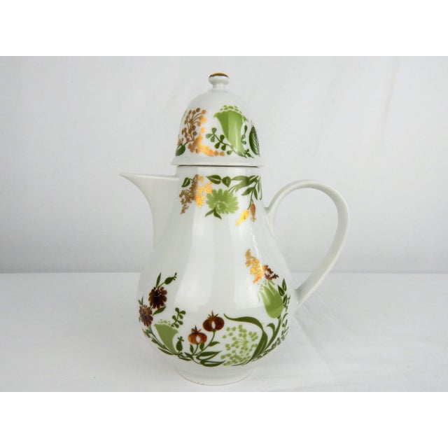 Mid-Century East German Henneberg Porcelain Chocolate Pot with floral decoration and gilding. Base signed, "Henneberg...