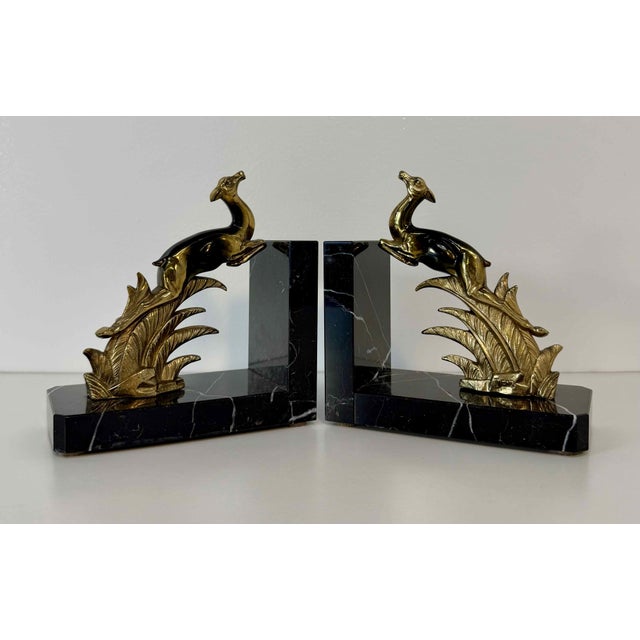 Elegant pair of French Art Deco bookends produced in the 1930s and signed "Tedd". The bookends depict a pair of stylized...