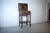 This is a restored side table from 1910 in the Art Nouveau style. The table is made of local oak and features a drawer...