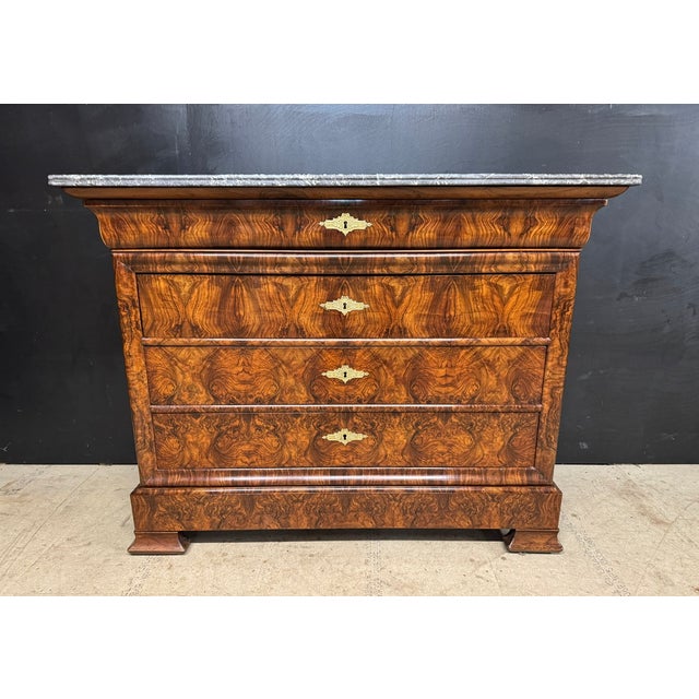 A stunning French Louis Philippe Commode, chest of drawers. Excellent burr walnut adorns the front and its original marble...