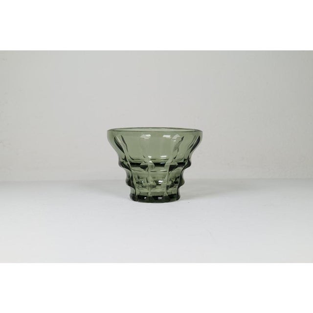 This piece was made in Sweden during the late 1920 early 1930s. M Exceptional made in green, grey tones this bowl makes a...