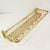 Wall-mounted coat rack, German origin, 1960s. It features 6 hooks for hanging clothes, an upper shelf, and a smaller lower...