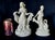 A pair of Antique Art Deco Flower Frogs. The Flower Frogs are made of porcelain and depict lovely ladies. Both are signed...