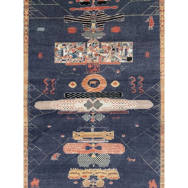 This Mid-20th century Turkish Anatolian accent carpet presents an extraordinary pictorial composition arranged across a...