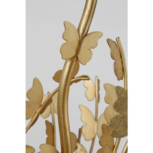 Farfalle Large Linear Chandelier in Gild Designer: Julie Neill Canopy: 6" Round Mounting: Chain Shade Detail: No Option...