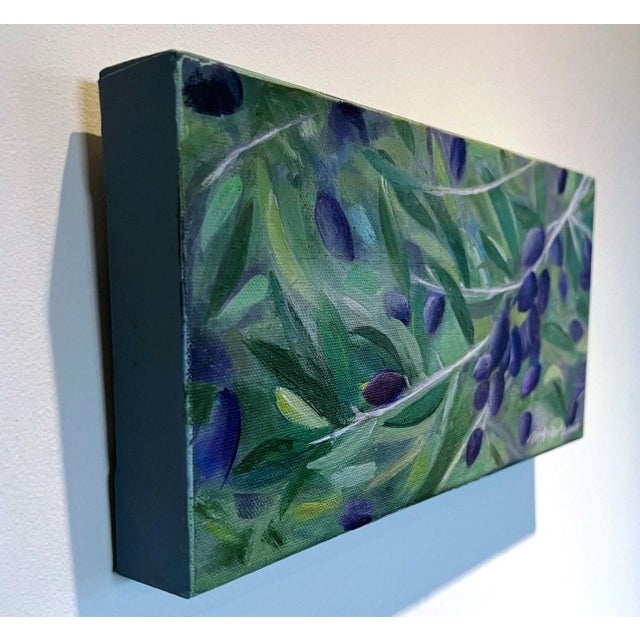 The seven olive trees in our front yard drew me to the purple and green, two of my favorite colors.