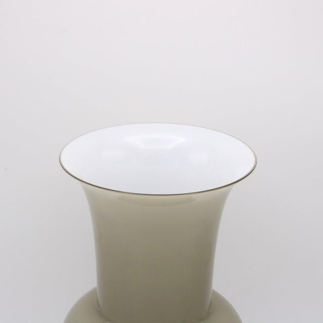 "Incamiciato" Italian art glass vase by Tomaso Buzzi for Venini. Cased glass, clear, white and grey, deep purple foot....