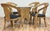 Unique tessellated inlaid coconut shell mosaic dining set with glass top table and four matching chairs. Clear lacquer...