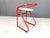 Postmodern red tubular metal stools by Samo. Attractive design. 1980s - France Plywood seats. Salvaged from a school, used...