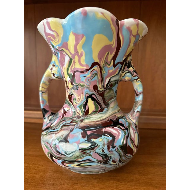 Double handle vase glazed in a multi colour marble pattern. Mid century. I think it English. Memphis style.
