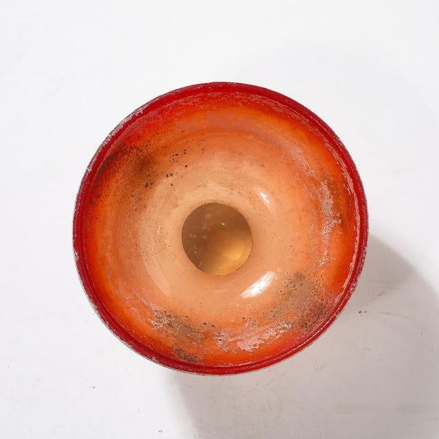 Introducing a stunning exemplar of Mid-Century Modernist artistry: a Hand-Blown Murano Scavo Glass Bowl, signed by...