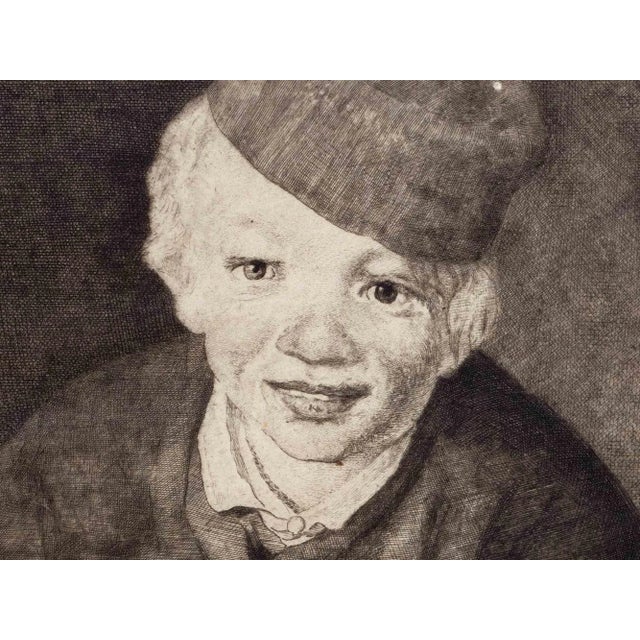 Boy with Cherries is a modern artwork realized after Edouard Manet by Henri Bérengier. Black and white etching. Signature...