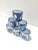 A charming set of four vintage porcelain napkin rings in classic blue and white chinoiserie patterns. Each ring features...