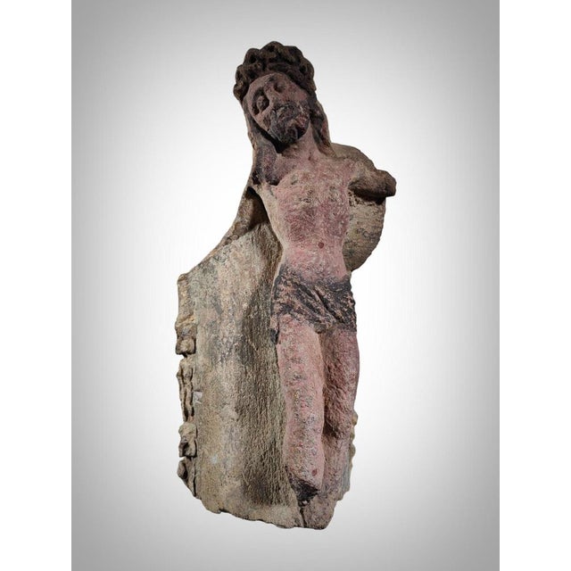 Immerse yourself in the majesty of 15th-century France with this significant Christo sculpture carved in stone and...