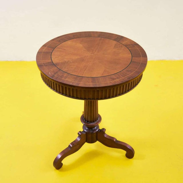 Discover the timeless appeal of this solid wood coffee table, featuring a sturdy base and refined design. With its rounded...