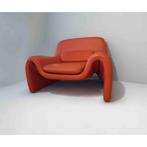 Vintage leather armchair realized by Cinova in 1980s, after Pierre Paulin's F598 Artifort Model. Upholstered with a...