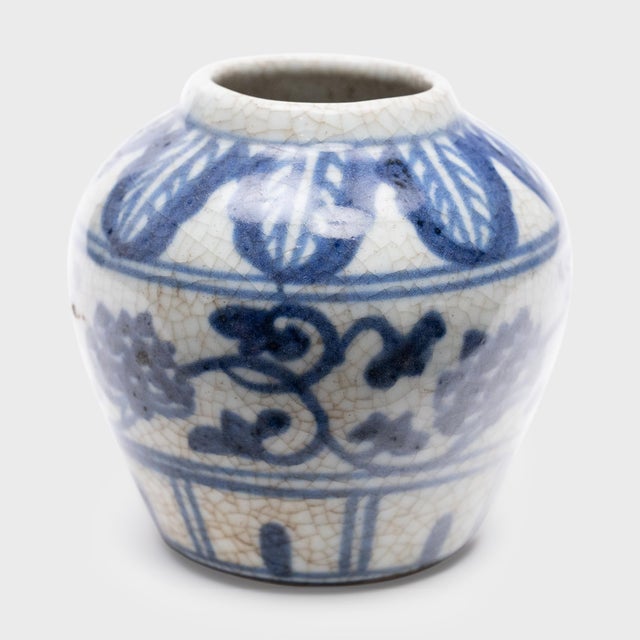 Brushed in cobalt blue underglaze and finished with a crackled glaze, this petite tea leaf jar exemplifies the timeless...
