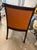 This vintage brown caned arm chair with brass nailhead trim by Hickory Chair exudes a timeless charm and sophistication....