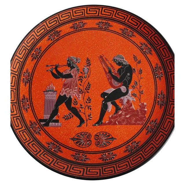 This impressive 32 cm vintage greek terracotta decorative wall plate beautifully captures the elegance of classical...