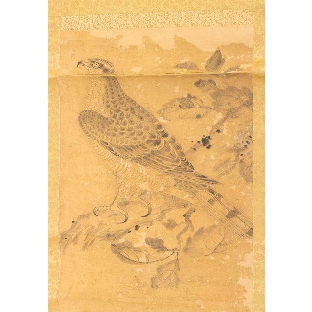 Japanese School, Landscape Scene of a Perched Hawk, Ink on Paper, 19th century, mounted on a silk scroll, remnants of chop...