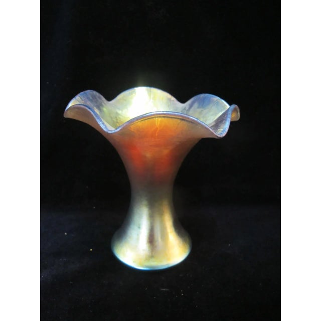 Stunning vintage Steuben vase, flaring from waist with ruffled rim in gold Aurene glass with colorful iridescent...