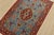 An authentic vintage traditional Qom rug hand-knotted with fine wool and natural dyes. This intricately woven rug features...