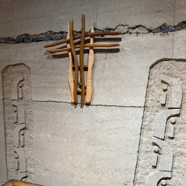 For your consideration, a handmade, contemporary wooden wall cross featuring an abstract, multi-tiered design with natural...
