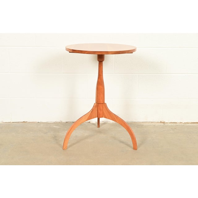 A beautiful Arts and Crafts or Shaker style solid cherry wood pedestal occasional side table or drinks table By Harden...