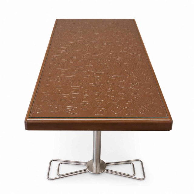 An extraordinary Space Age coffee table. It is made entirely of plastic (polyurethane), glass, and metal. The unique base...