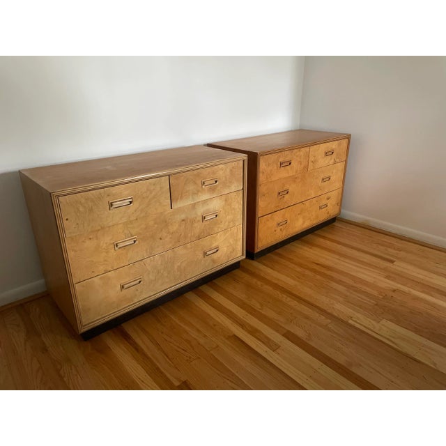 Set of two Henredon Burl Wood Scene Two Bachelor's Chests. Each chest has four dovetailed drawers with inset sculpted wood...