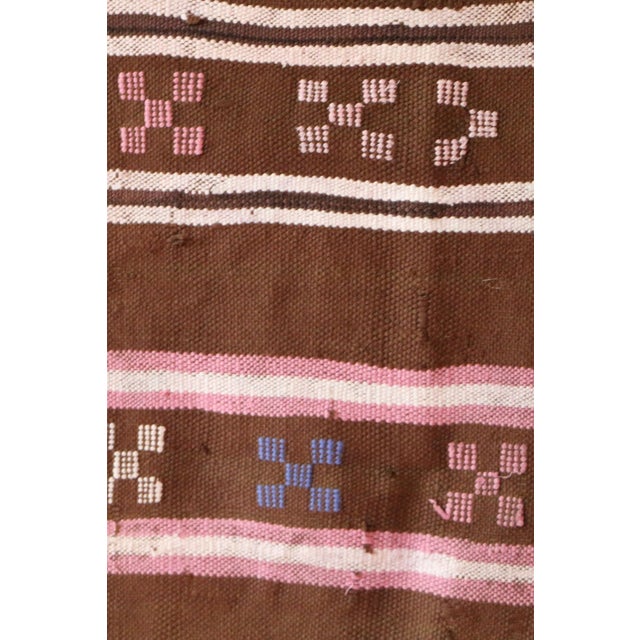 Handwoven by Berber women in the Atlas Mountains of Morocco, the cactus silk rug also called ‘Sabra’ use symbolic motifs...