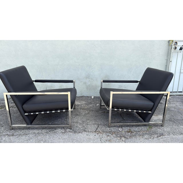 Minotti Black Leather Atlan Chairs by Rodolfo Dordoni - A Pair previouslyowned showing normal signs of use in good...