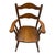 A charming mid-20th-century child’s rocking chair by Ramsdell of Gardner, Massachusetts, retaining its original factory...