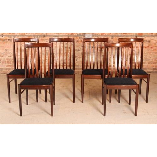 Set of 6 Danish Mid Century mahogany dining chairs by H.W. Klein for Bramin, circa 1960s. Newly reupholstered with...
