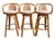 A well-executed set of vintage swivel bar stools with a clean organic modern profile. Crafted from warm-toned rattan with...