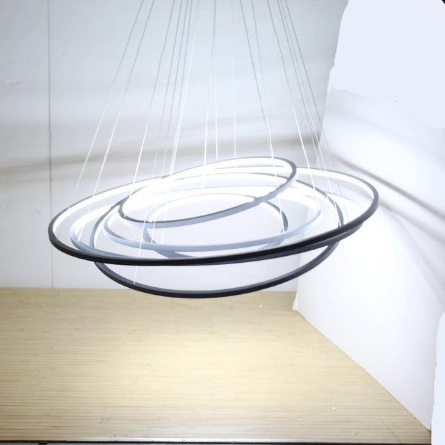 Unused, never installed large, versatile modern space age chandelier with 6 hoop ring LED lights. Each ring is 5/8" wide...