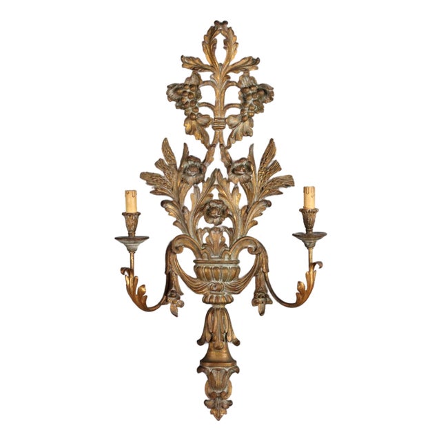 Wall Light in Carved and Gilded Wood For Sale