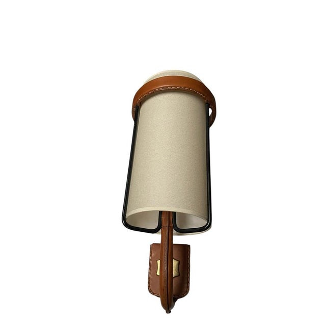 Stitched Leather Sconces by Jacques Adnet, 1950s, Set of 2, in Good conditions. Designed 1950 to 1959 I have official...