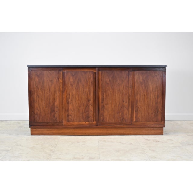 1960's Slate top and walnut credenza attributed to Jack Cartwright for Founders Furniture. Slate top in good original...