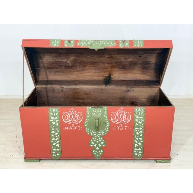 For sale is an antique solid wood chest dating from around 1800. This magnificent chest is an authentic testament to its...