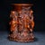 This exquisite pen holder is crafted from high-quality boxwood and features intricate carvings of the Eight Immortals, a...