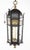 Baroque style wrought iron and bronze hanging lantern with distinctive bronze decorative plaques and original chain and...
