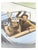 Early 20th century colortone advertising photograph of a man and woman waving from their convertible car. Unsigned....