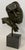 Bronze figurative sculpture after Salvador Dali (1904-1989) mounted on black marble pedestal. Measures: 17.75" High x...