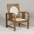 This Anglo-Indian armchair showcases exquisite craftsmanship and cultural heritage through intricate bone inlay featuring...