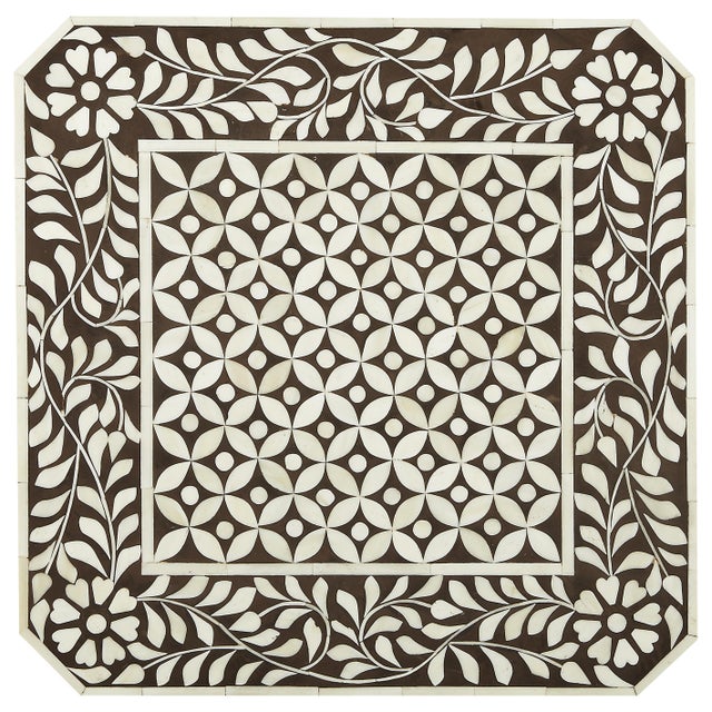 Add this table to your favorite powder room, guest room or relaxing corner! This Brown Bone Inlay accent table has a...